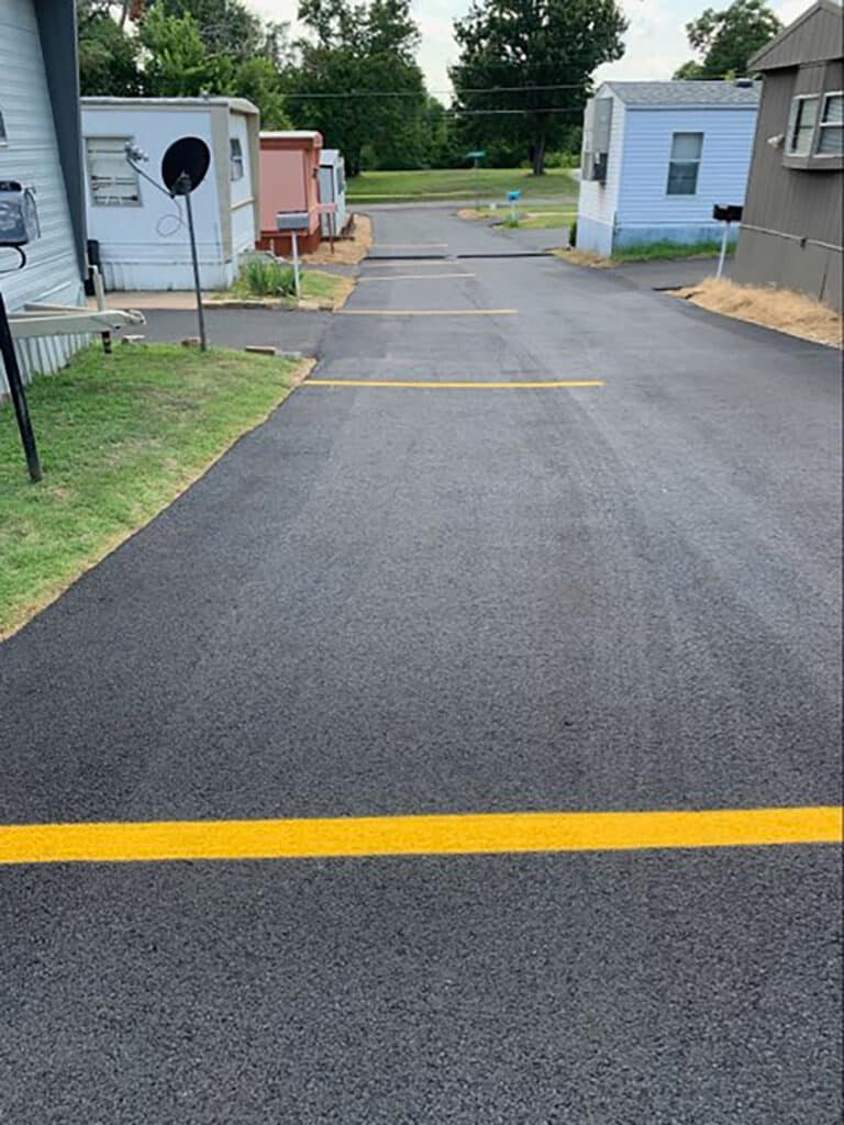 Freshly installed lines for parking spaces in a local street.