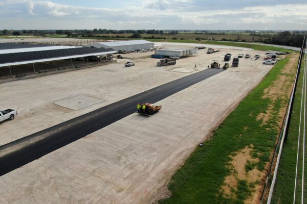 The pavement team is laying a new asphalt driveway.